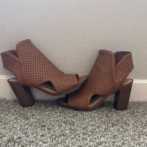 Brown heeled booties. Barely Worn. Great condition. Size 6.5